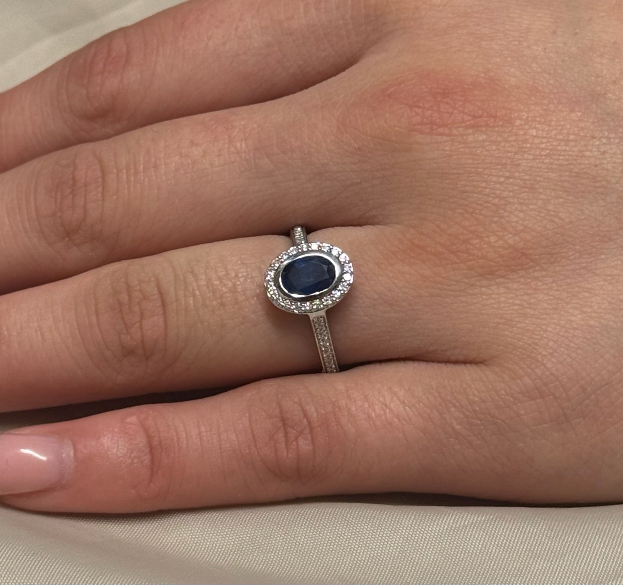 9ct White Gold Oval Sapphire and Diamond Halo Ring