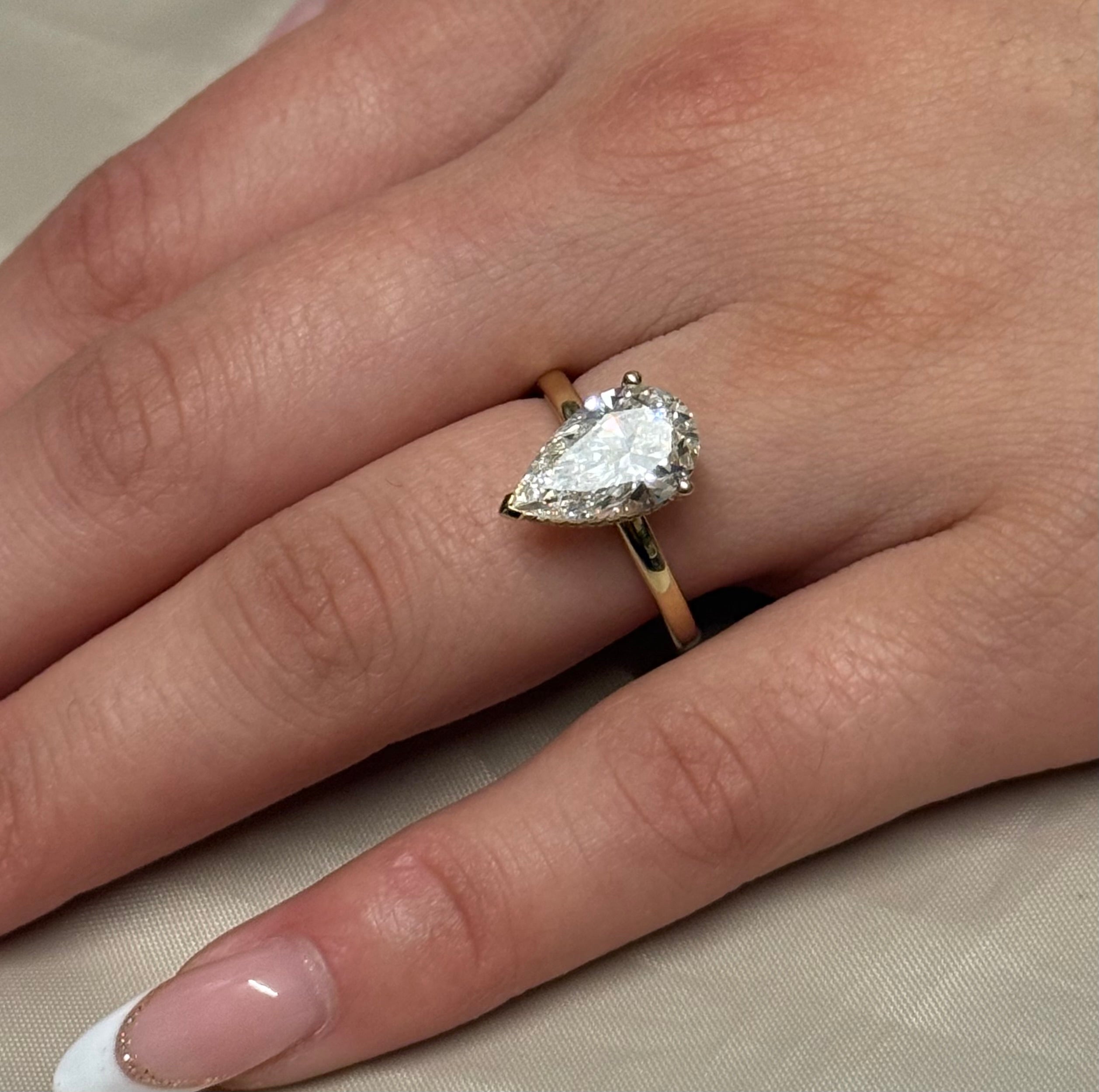 9K Laboratory Grown Diamond 3.01ct Pear Solitaire with a Hidden Halo