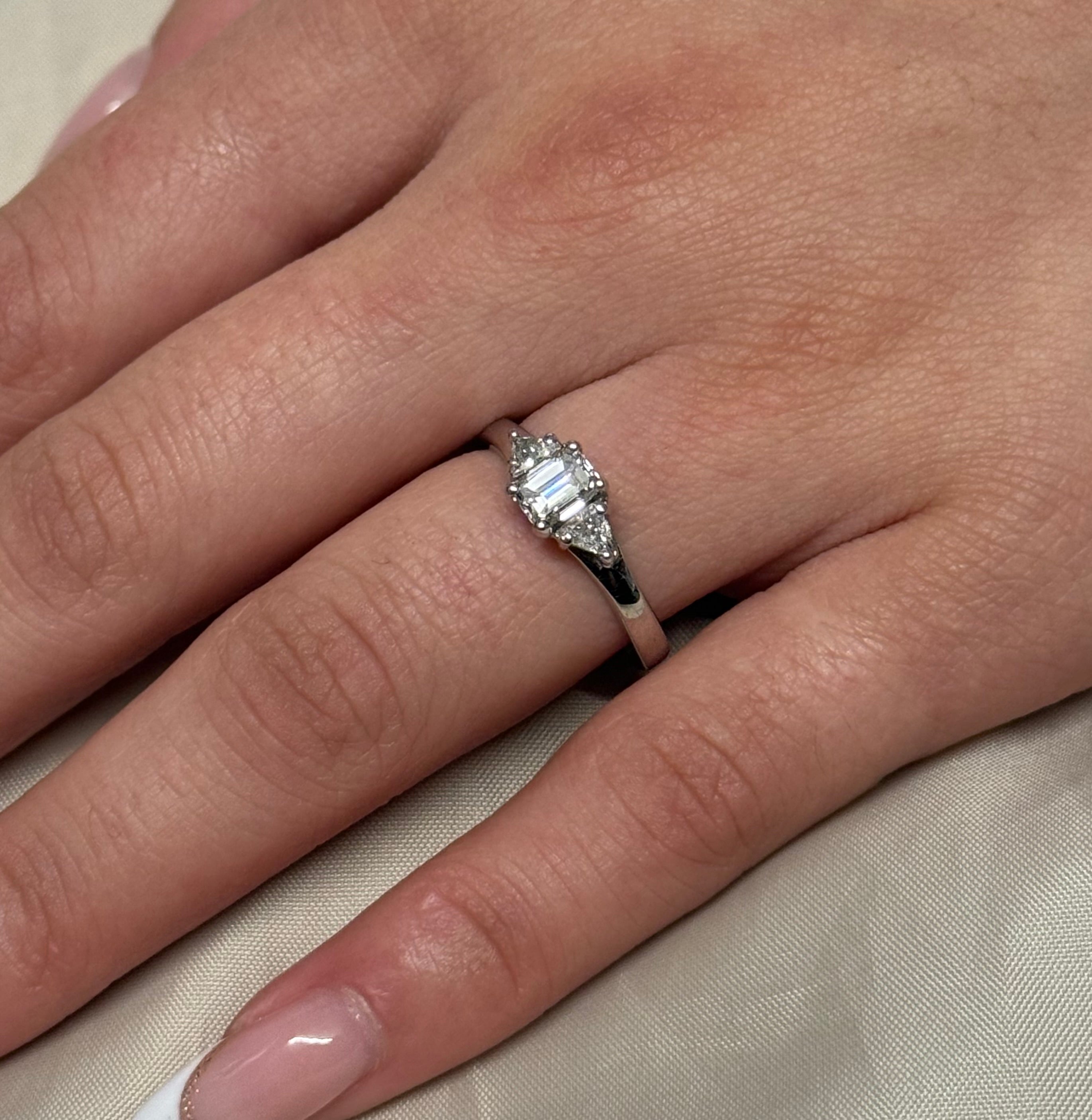 18K White Gold Emerald and Trillion Cut Three Stone Diamond Ring