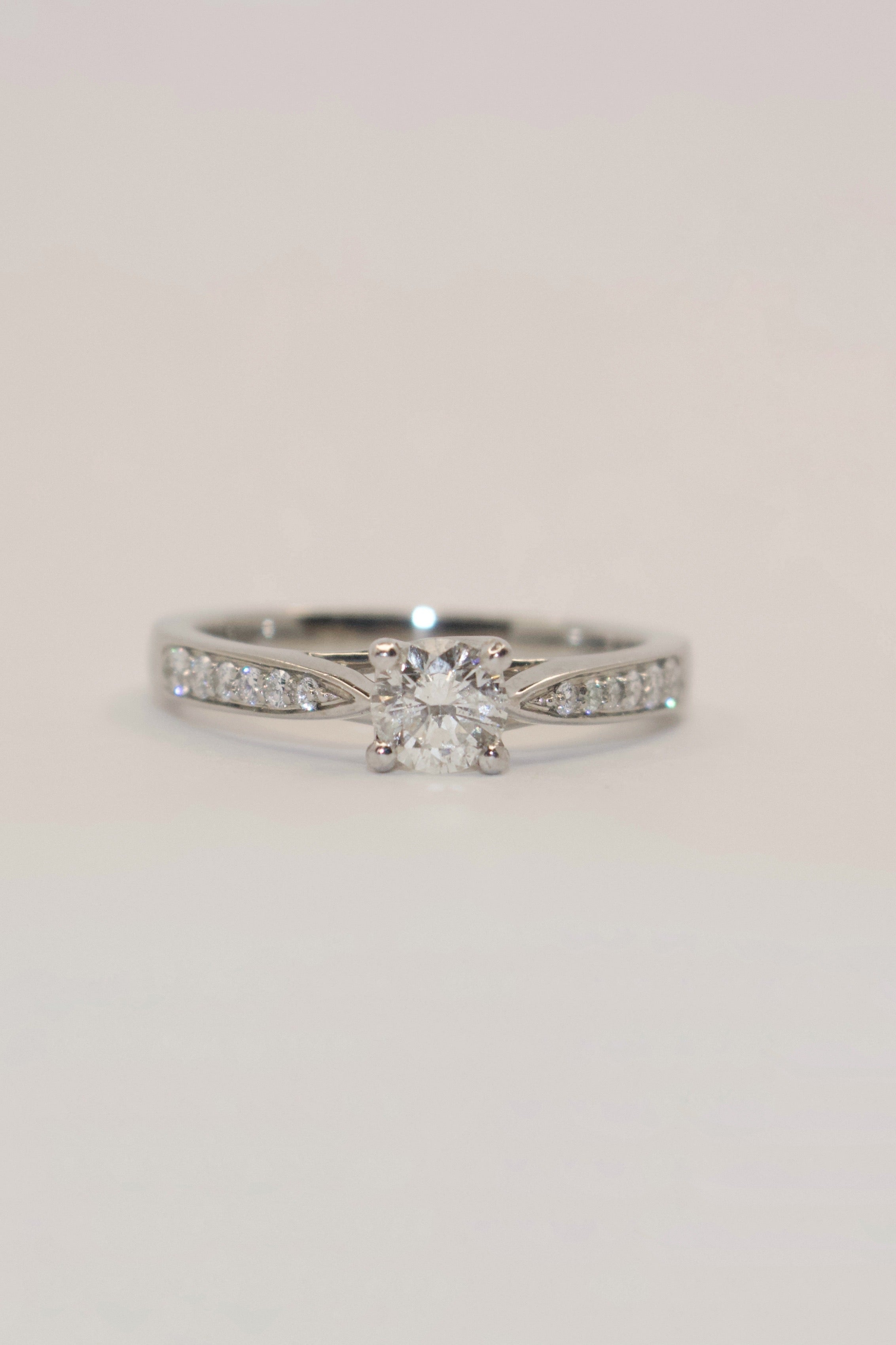 Platinum Brilliant Cut Diamond Solitaire With Diamond Band