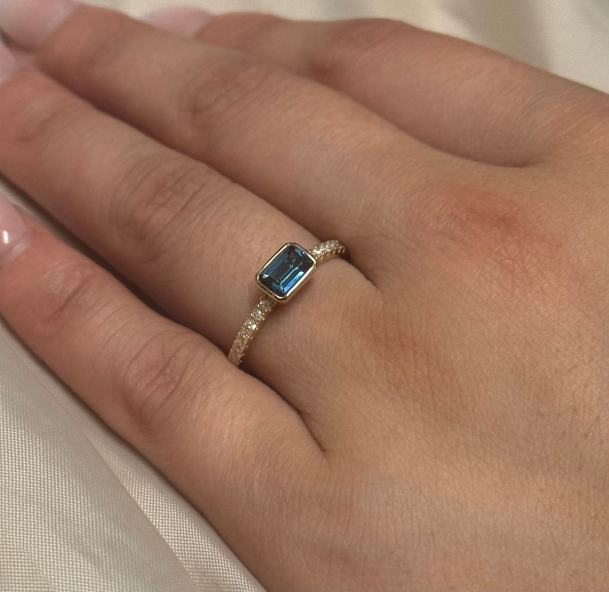 9K Yellow Gold East West Emerald Cut London Blue Topaz Ring With Diamond Band