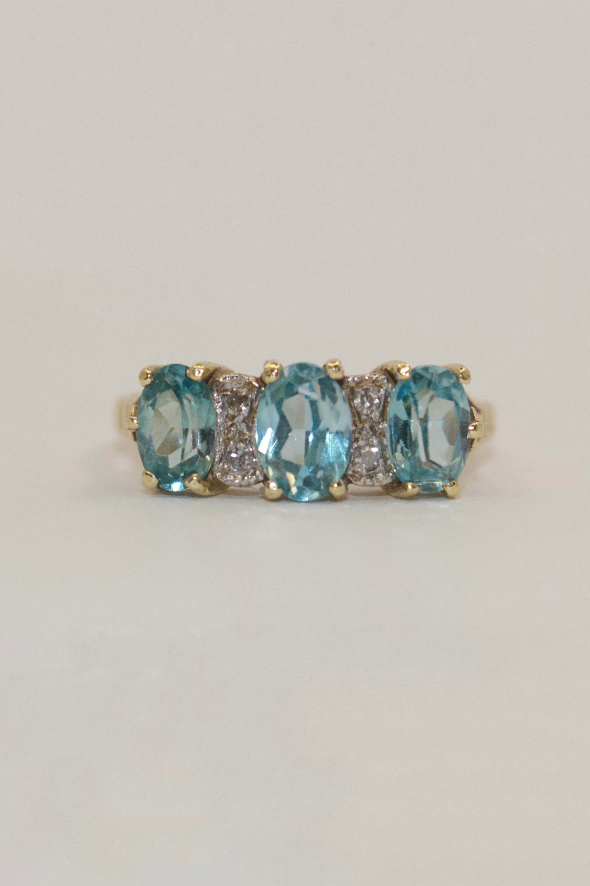 9K Yellow Gold Blue Topaz and Diamond Three Stone