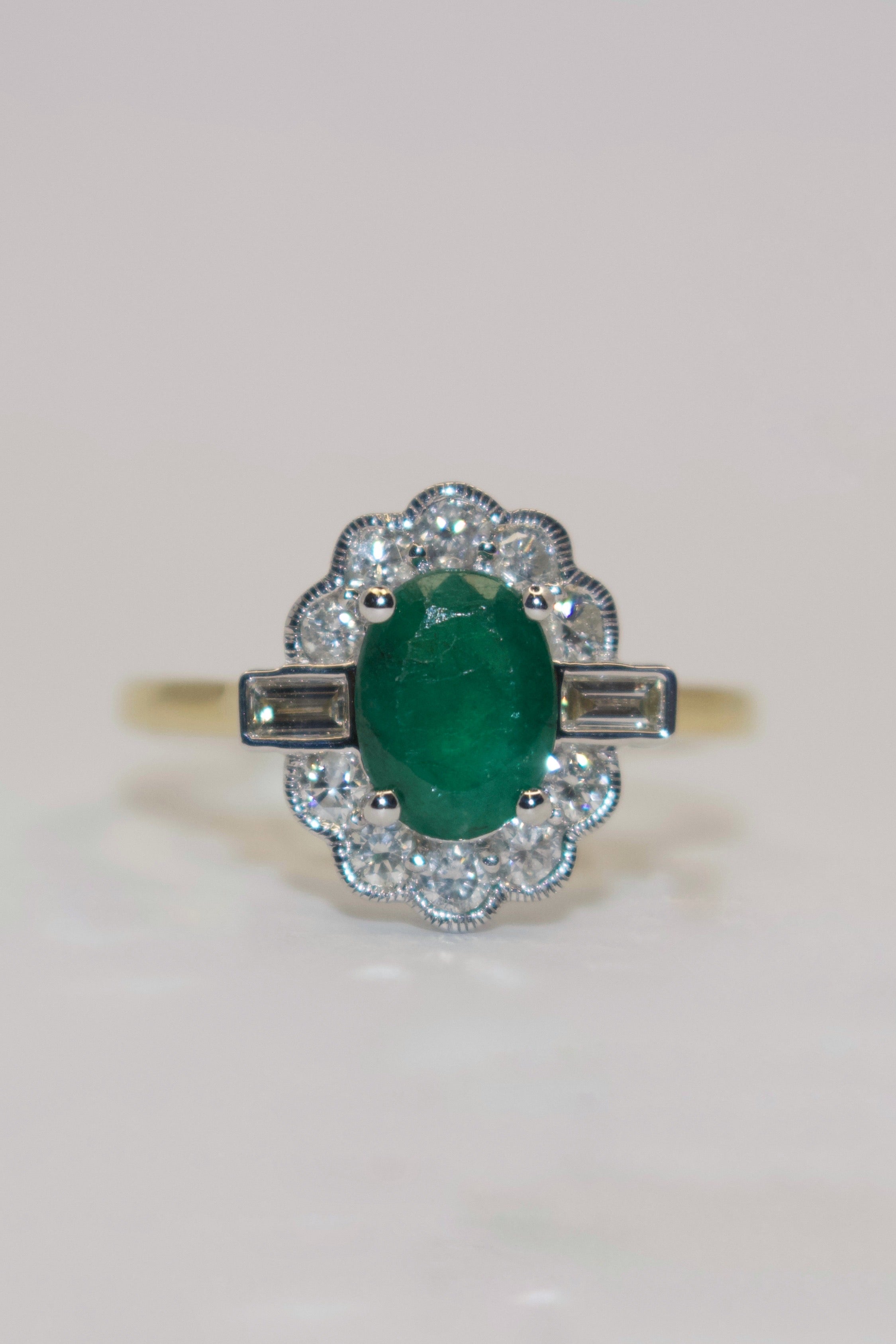 9K Yellow Gold Emerald and Diamond Cluster with Baguette side stones