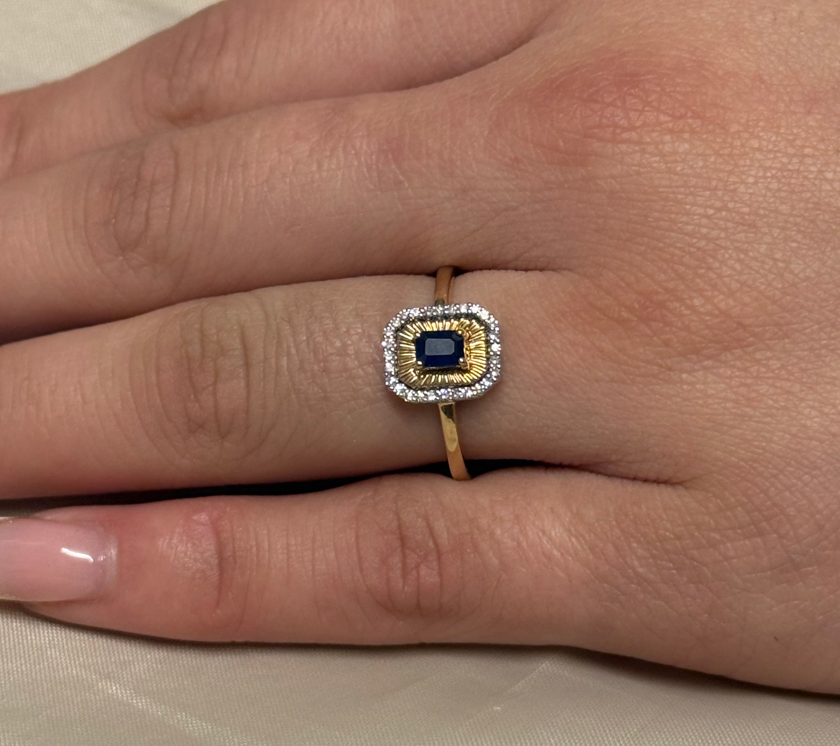 9K Yellow Gold Emerald Cut Sapphire with Diamond Halo