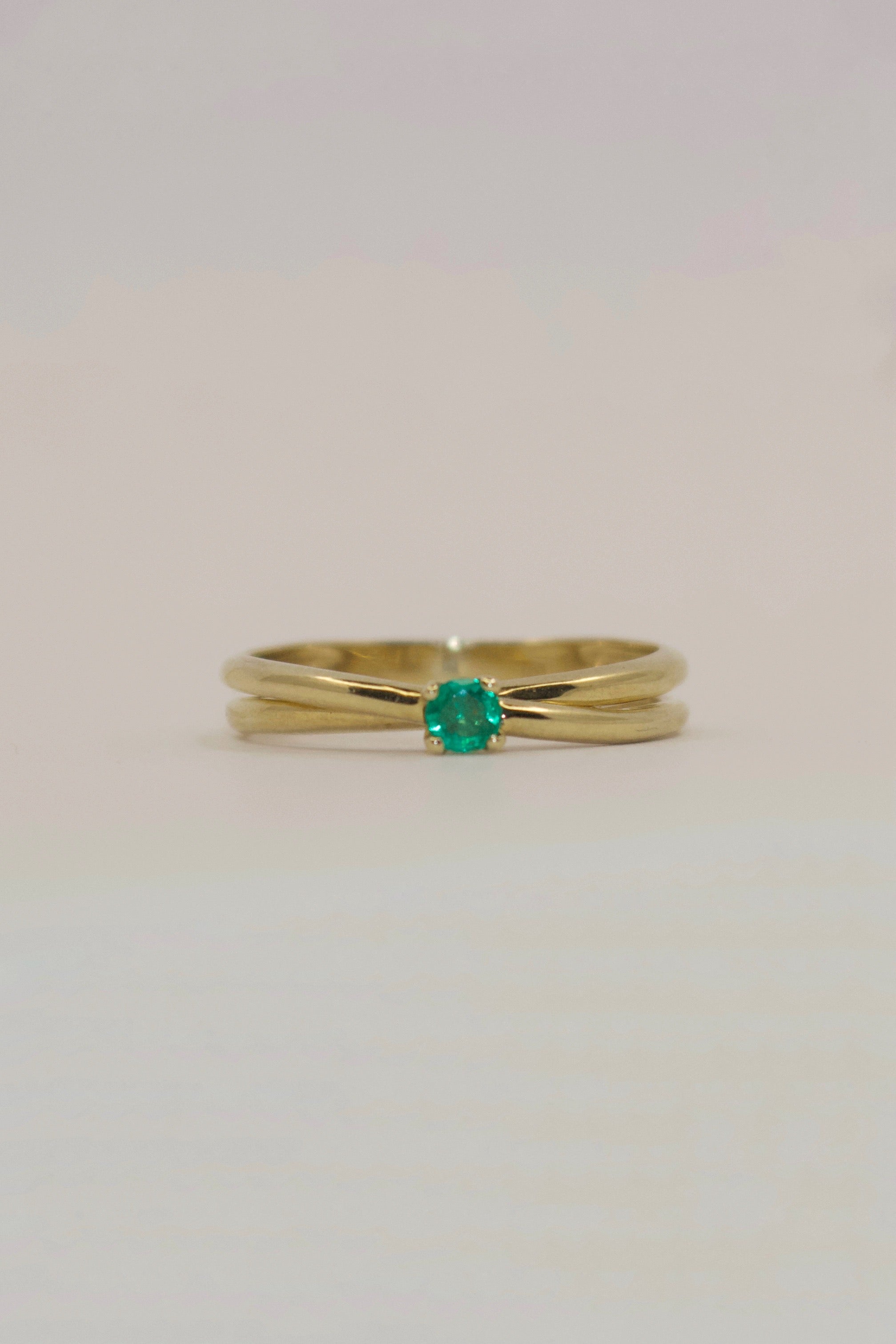 9K Yellow Gold Cross Band Emerald Solitaire